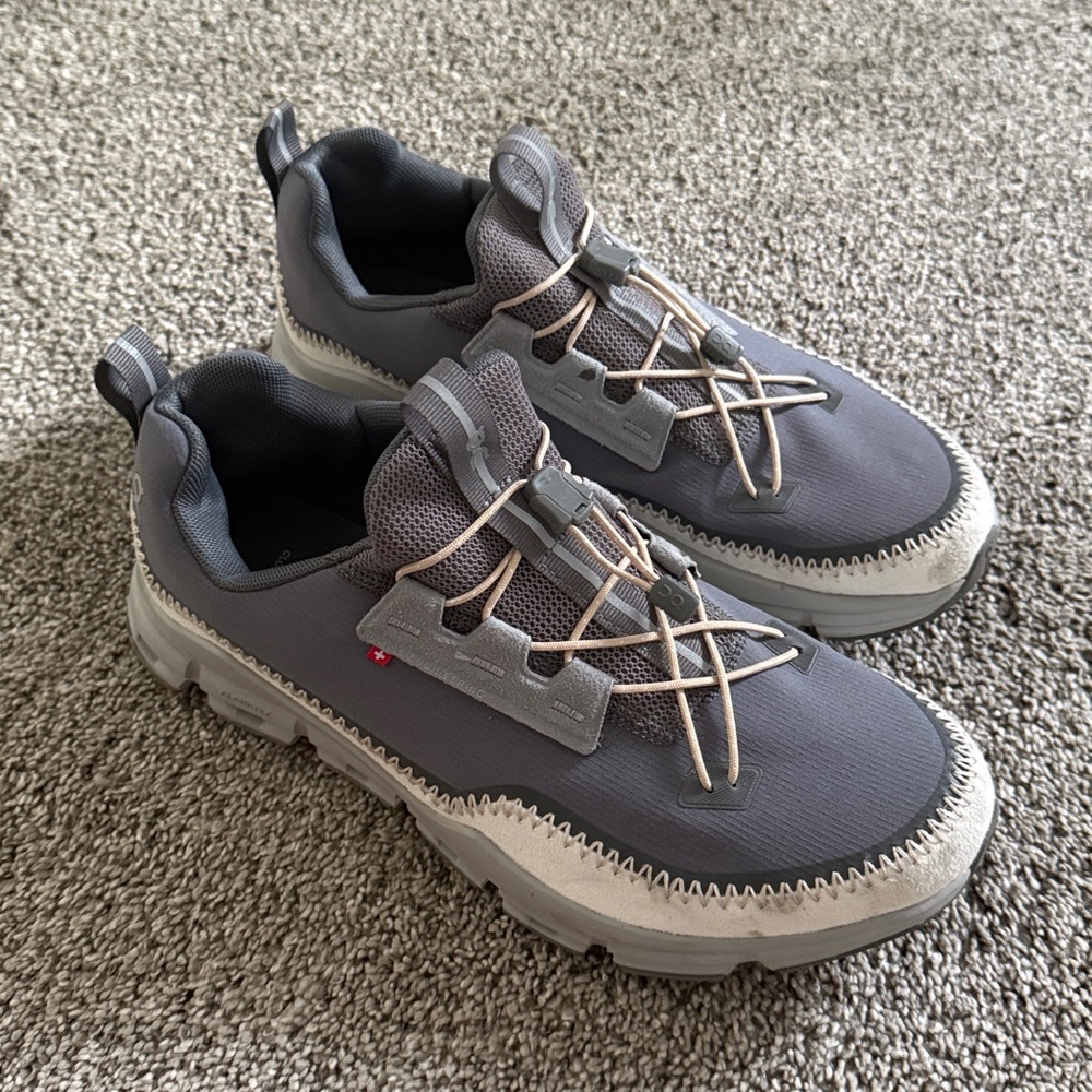 On Running Gray and White Sneakers